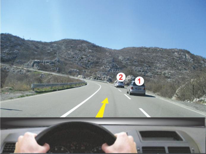 U situaciji prikazanoj na slici vozila 1 i 2, koja se kreću jedno iza drugog: