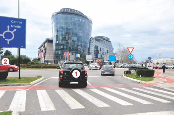 In the situation shown in the picture, the driver of vehicle 1 will act according to: