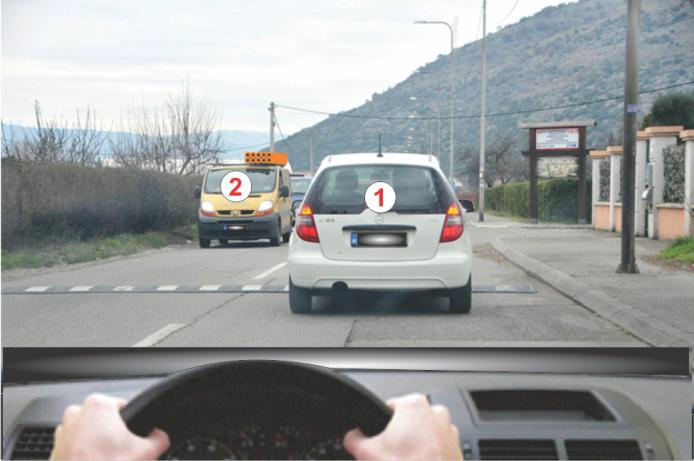 The load on vehicle 2 exceeds for 1,5 m the most protruding point on the front of the vehicle, which is: