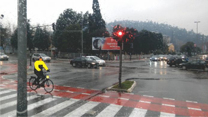 In the situation shown in the picture, red wide longitudinal lines across the pedestrian crossing indicate: