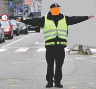 A sign given by a police officer, as in the picture, can be given:
